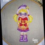 grille broderie doll