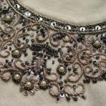 motif broderie avec perles