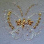 motif broderie avec perles