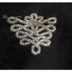 motif broderie avec perles