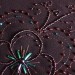 motif broderie avec perles