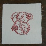 modèle broderie rouge