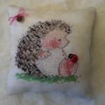 grille broderie herisson