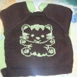 grille broderie sur tricot